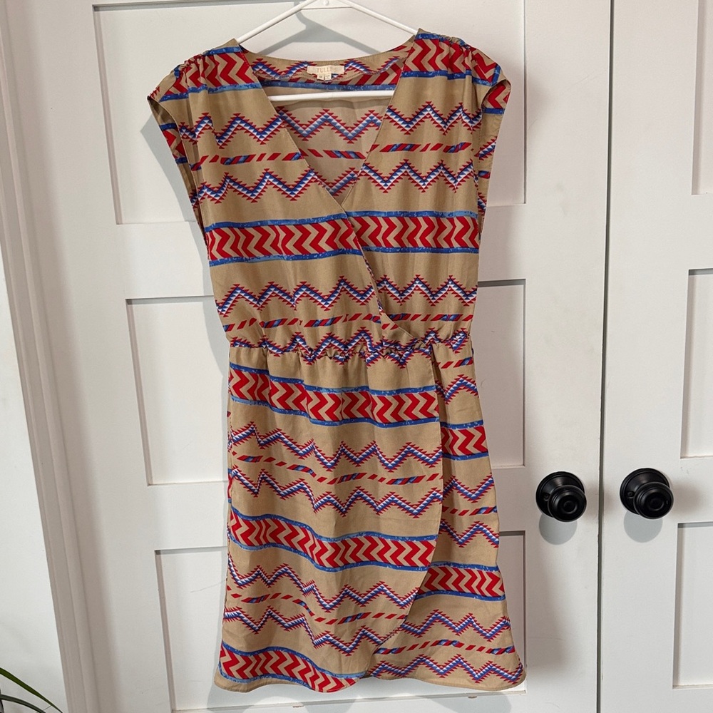 Tulle Chevron Mini Dress in Red and Blue on Tan Background